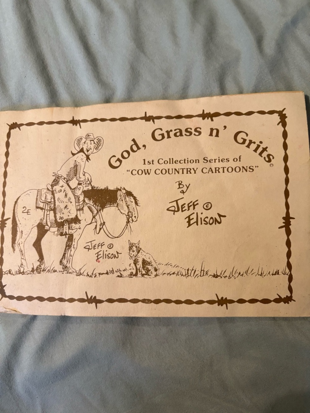 God, Grass n' Grits Cartoon Book by Jeff Elison - Beige Cover